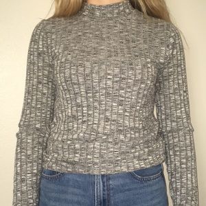Gray an white ribbed mock neck.